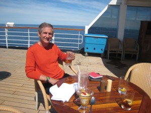 Enjoying the sunshine with a drink on the Lido Deck!